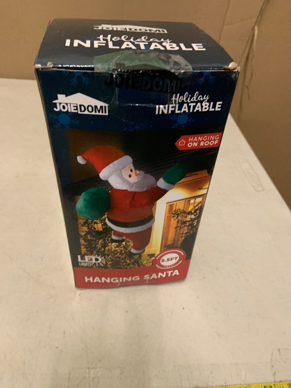 Photo 1 of Joiedomi 5 FT Tall Christmas Inflatables Outdoor Decorations Hanging Santa with Gift Bag, Christmas Blow Up Climbing Santa Yard Decoration with Build-in LED for Xmas Party, Garden, Lawn Decor