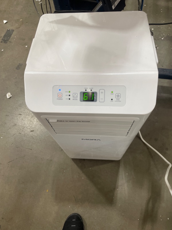 Photo 1 of Mora Mora by Hisense 5,000 BTU (DOE), 8,500 BTU (ASHRAE), Portable Air Conditioner, 3 Operating Modes (Cool, Dry, Fan), Cools up to 150 SF, Remote Control and Window Vent Installation Kit Included