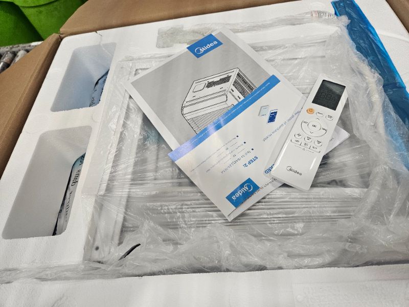 Photo 1 of Midea 8,000 BTU Smart Inverter Air Conditioner Window Unit with Heat and Dehumidifier – Cools up to 350 Sq. Ft., Energy Star Rated, Quiet Operation, Electronic Controls, Remote Control, White