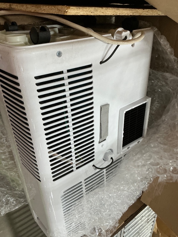 Photo 1 of *CORD CHARGER DAMAGED* BLACK+DECKER Portable Air Conditioner, 9,000 BTU (5,300 BTU SACC) for Rooms up to 400 Sq. Ft., Portable AC with Follow Me Remote Control and Window Kit, BPACT08WT, White