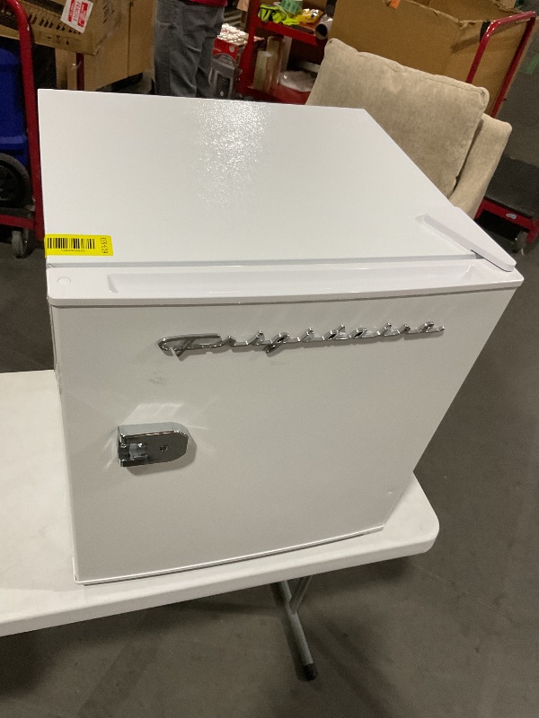 Photo 1 of Frigidaire Retro Compact Fridge with Chiller, Countertop, Built-In Bottle Opener, Compact Refrigerator 1.6 cu ft, Mini Fridge for Office, Bedroom, Dorm Room or Cabin - 16" D x 18" W x 18.5" H (White)