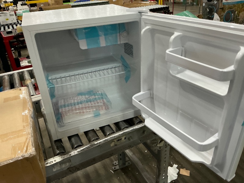 Photo 1 of Frigidaire Retro Compact Fridge with Chiller, Countertop, Built-In Bottle Opener, Compact Refrigerator 1.6 cu ft, Mini Fridge for Office, Bedroom, Dorm Room or Cabin - 16" D x 18" W x 18.5" H (White)