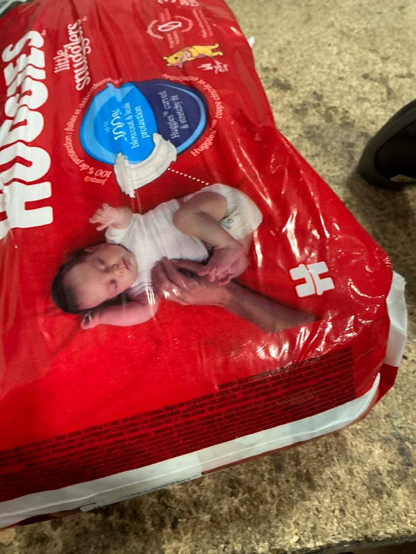 Photo 1 of Huggies Size Newborn Diapers, Little Snugglers Baby Diapers, Size Newborn (up to 10 lbs), 31 Count, Packaging May Vary