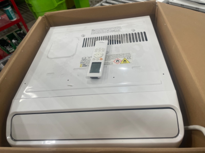 Photo 1 of Midea 12,000 BTU Smart Inverter Air Conditioner Window Unit with Heat and Dehumidifier – Cools up to 550 Sq. Ft., Energy Star Rated, Quiet Operation, Electronic Controls, Remote Control, White