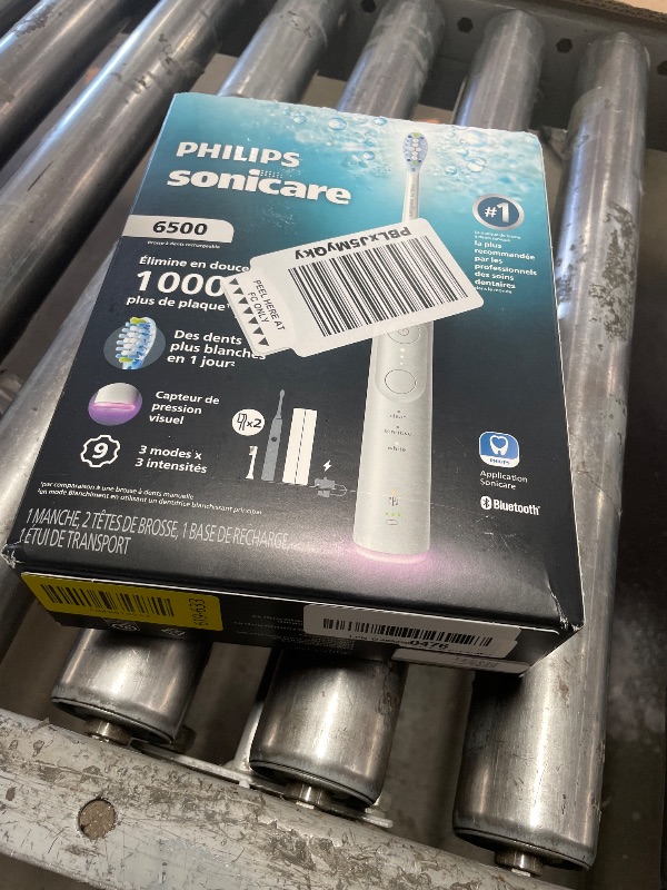Photo 1 of (saled)Philips Sonicare 6500 Series Electric Toothbrush - Next-Generation Sonicare Technology, Pressure Sensor, 9 Brushing Settings, SmarTimer, BrushPacer, 21-Day Runtime, Travel Case, White, HX7410/10