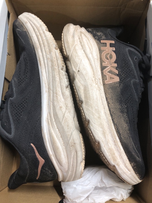 Photo 1 of (used) (see all images) Hoka Women's Clifton 10 Sneaker, Black/Rose Gold, 9