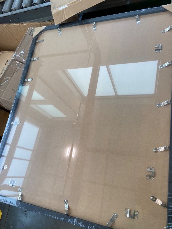 Photo 1 of *Look at pic* Fxojyvo Engineered Wood 24x30 Frame, Black Picture Frame for 24 x 30 Inch Poster Puzzle Photo, Light Weight 24 by 30 Poster Frame with Wood-grain for Wall - 1 Pack/Black/24 x30