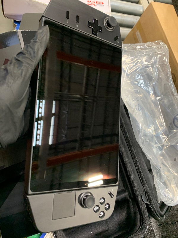 Photo 1 of ** USED/ UNTESTED ** Lenovo Legion Go 8.8" 144Hz WQXGA Handheld Touchscreen Gaming PC AMD Ryzen Z1 Extreme 16GB RAM 512GB SSD Shadow Black, 8APU1