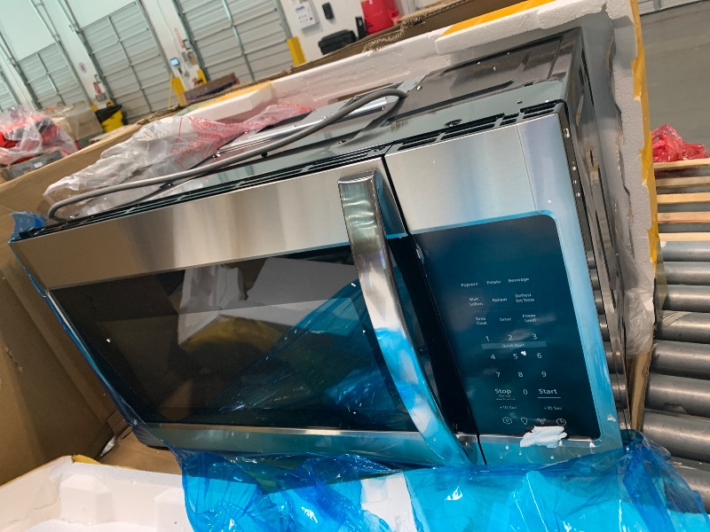 Photo 1 of ** UNTESTED *** BLACK+DECKER Over the Range Microwave Oven with Vent and One-Touch Auto Cooking, 1.7 cu. ft. OTR Over Stove Microwave, Stainless Steel, 1000 Watts, EM044K6CE-SS