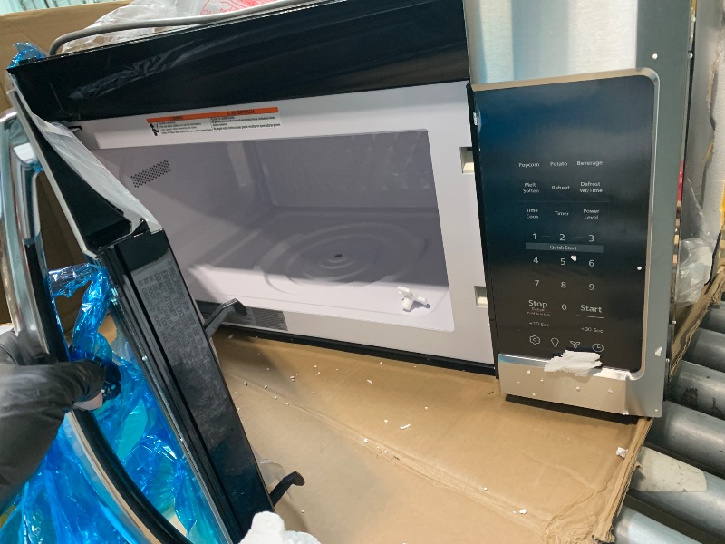 Photo 1 of ** UNTESTED *** BLACK+DECKER Over the Range Microwave Oven with Vent and One-Touch Auto Cooking, 1.7 cu. ft. OTR Over Stove Microwave, Stainless Steel, 1000 Watts, EM044K6CE-SS