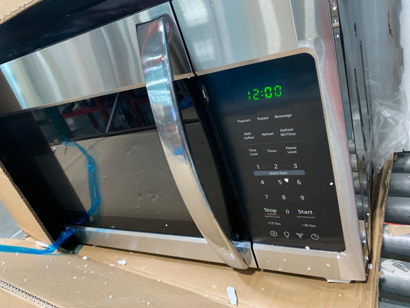 Photo 1 of ** UNTESTED *** BLACK+DECKER Over the Range Microwave Oven with Vent and One-Touch Auto Cooking, 1.7 cu. ft. OTR Over Stove Microwave, Stainless Steel, 1000 Watts, EM044K6CE-SS