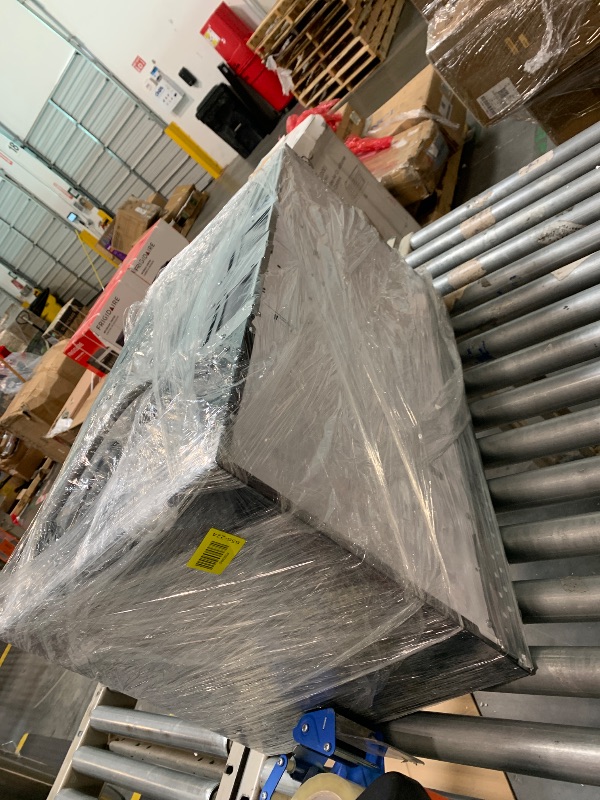 Photo 1 of ** UNTESTED *** BLACK+DECKER Over the Range Microwave Oven with Vent and One-Touch Auto Cooking, 1.7 cu. ft. OTR Over Stove Microwave, Stainless Steel, 1000 Watts, EM044K6CE-SS