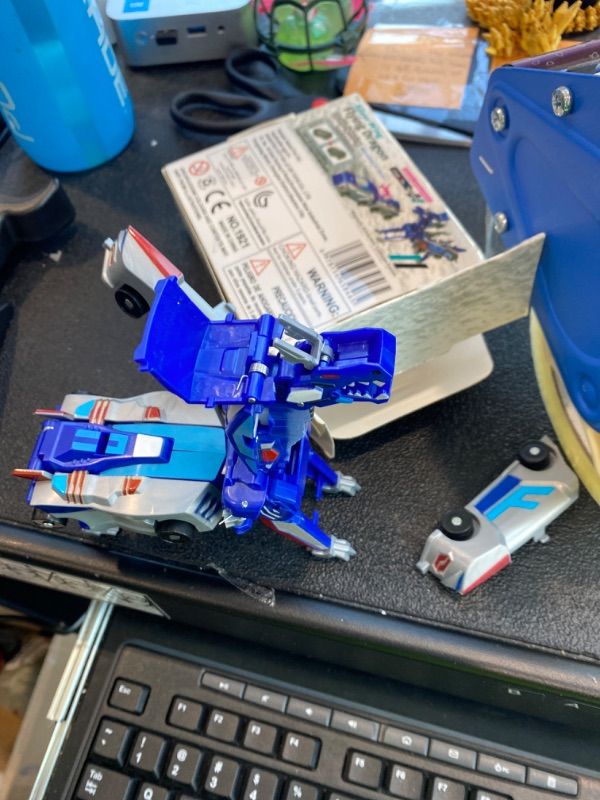 Photo 1 of ***MINOR DAMAGE*** ***READ CLERK NOTES*** Gkiozu Transforming Dinosaur Toys, 2 in 1 Magnetic Cars Collision Transform into Dino Toys, for Boys Girls Toy Age 2-12, Christmas Birthday Gift(Blue Dragon)