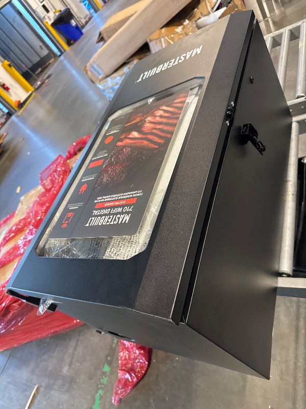 Photo 1 of ** UNTESTED/ DAMAGE MINOR** Masterbuilt®710 WiFi Digital Smoker, Vertical Design, 711 Cooking Sq. Inches, 4 Chrome Coated Smoking Racks, Wood Chip Loader, Electric Fuel Source to Plug in and Start Cooking, Black Model MB20070924