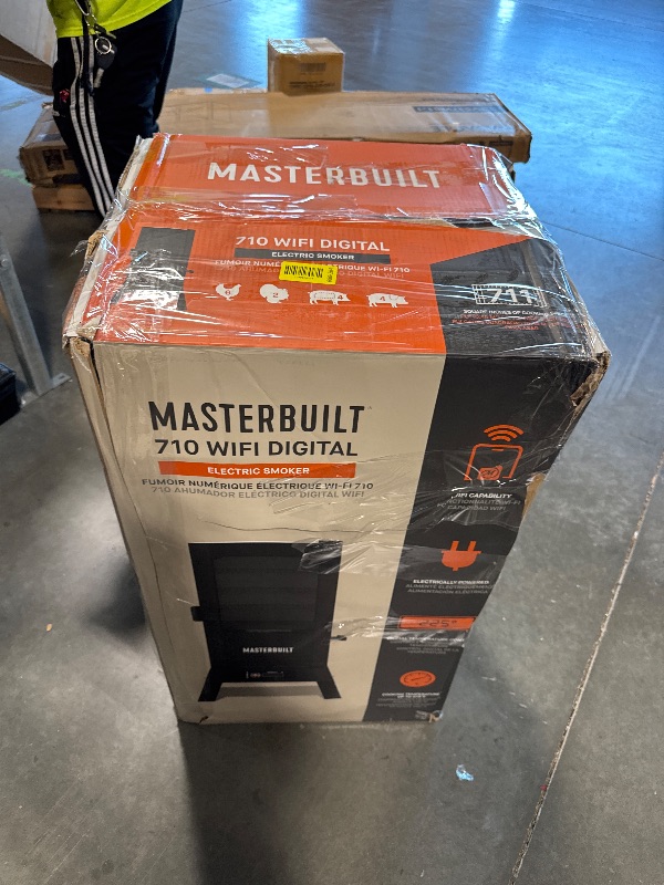 Photo 1 of ** UNTESTED/ DAMAGE MINOR** Masterbuilt®710 WiFi Digital Smoker, Vertical Design, 711 Cooking Sq. Inches, 4 Chrome Coated Smoking Racks, Wood Chip Loader, Electric Fuel Source to Plug in and Start Cooking, Black Model MB20070924
