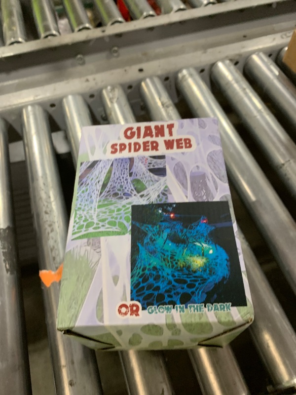Photo 1 of YHFUISK 700 sqft Giant Durable Spider Web for Halloween Decoration Outdoors, Glow in The Dark Stretchy Beef Netting, Green Giant Spider Web Outdoor Decoration (24FT x 4FT)