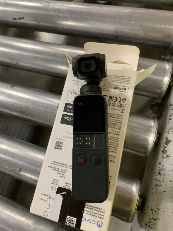 Photo 1 of DJI Osmo Pocket Handheld 3-Axis 4k Gimbal Stabilizer with Integrated Camera