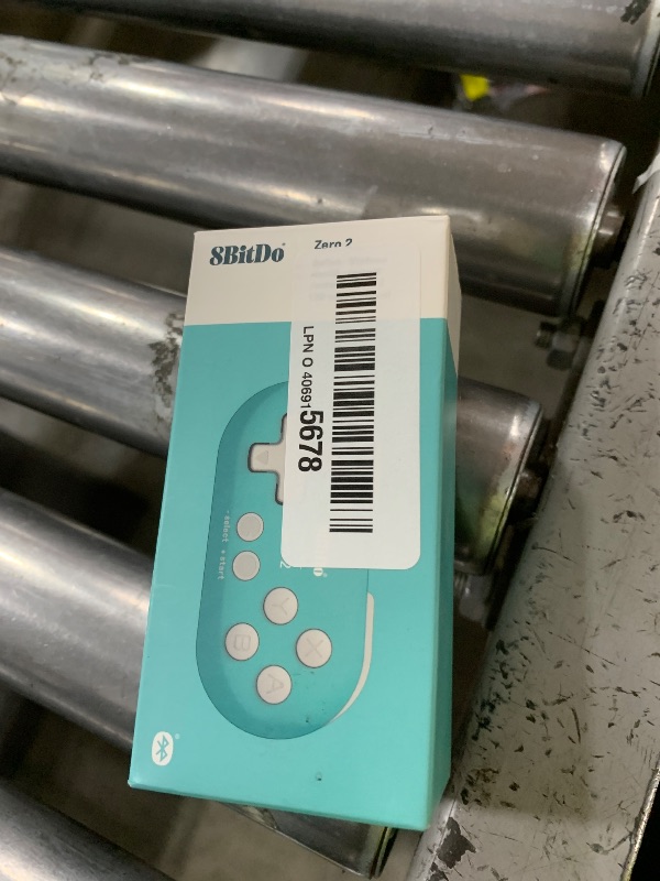 Photo 1 of Nargos 8Bitdo Zero 2 Bluetooth Key Chain Sized Mini Controller for Nintendo Switch, Windows, Android and macOS (Turquoise Edition)