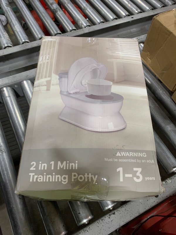 Photo 1 of CheerTry 2-in-1 Toddler Potty Training Toilet - Larger Potty Chair & Detachable Training Seat for Boys & Girls Ages 1-3 with Flushing Sound, Wipes Storage, Toilet Paper Holder - Pink