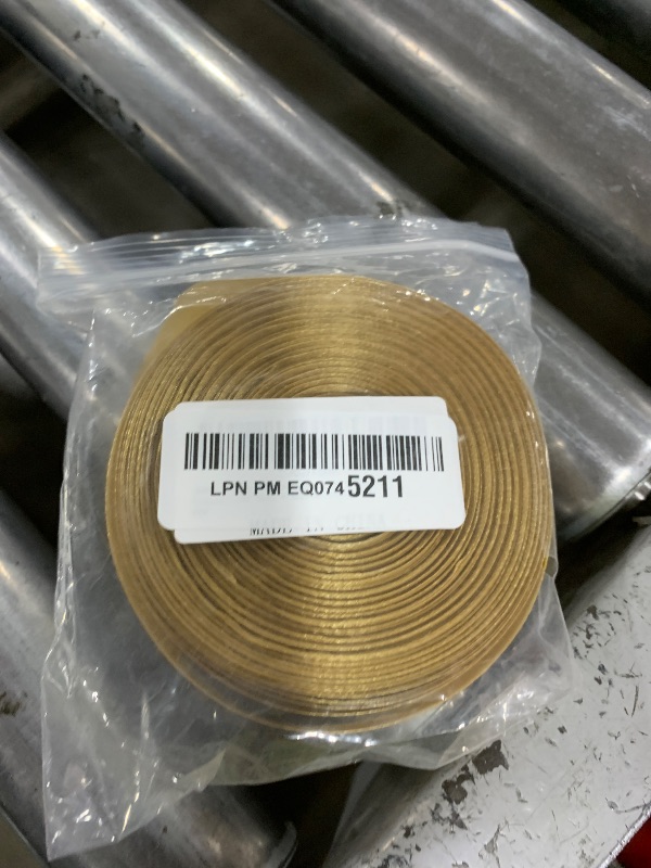 Photo 1 of Gold Roll of Ribbon 