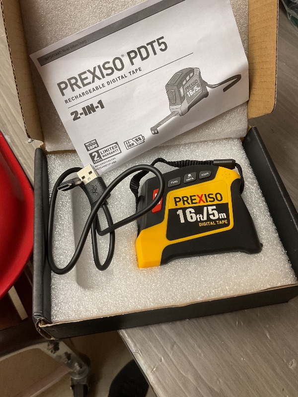 Photo 1 of PREXISO 2-in-1 Digital Tape Measure - 16Ft Rechargeable Measuring Tape Ruler Ft/Ft+in/in/M/CM/MM Unit - Metric & Inches Retractable Measurement Tape Tool with Magnetic Tip - Pythagorean, Area, Volume