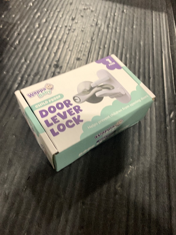Photo 1 of Door Lever Lock (1 Pack) Prevents Toddlers from Opening Doors. 3.25" L * 1.5" W * 4.5" H Easy One Hand Operation for Adults. Durable ABS with 3M Adhesive Backing. Simple Install, No Tools Needed.