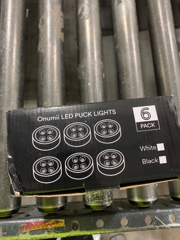 Photo 1 of Onumii Puck Lights with Remote Rechargeable Under Cabinet Lighting 1200mAh Colors Changing Lights Magnetic Stick on Lights for Kitchen, Counter, Shelves, Closet (6Pack Black)