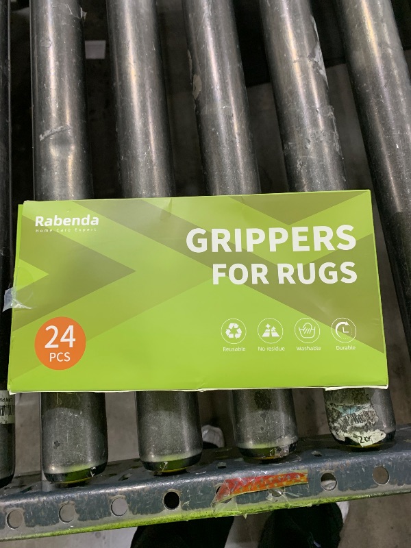 Photo 1 of Rabenda 24 Pcs Grippers for Rugs, Non Slip Rug Pads for Hardwood Floors and Tiles, Reusable Rug Tape for Area Rugs, Dual Sided Adhesive Rug Pad Gripper Keep Corners Flat(Black)