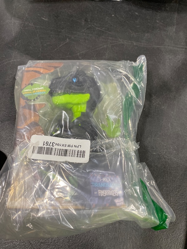 Photo 1 of Untamed Raptor by Fingerlings - Stealth (Green) - Interactive Collectible Dinosaur - By WowWee