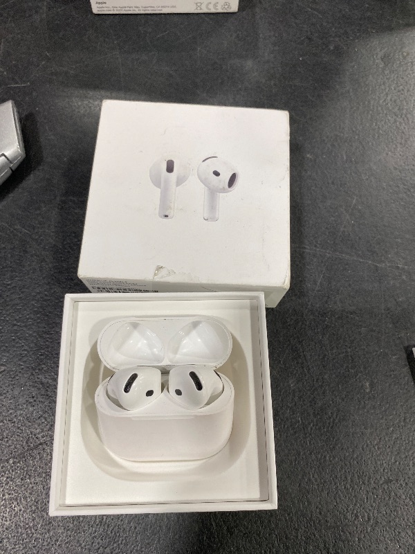 Photo 1 of Apple AirPods 4 Wireless Earbuds, Bluetooth Headphones, Personalized Spatial Audio, Sweat and Water Resistant, USB-C Charging Case, H2 Chip, Up to 30 Hours of Battery Life, Effortless Setup for iPhone