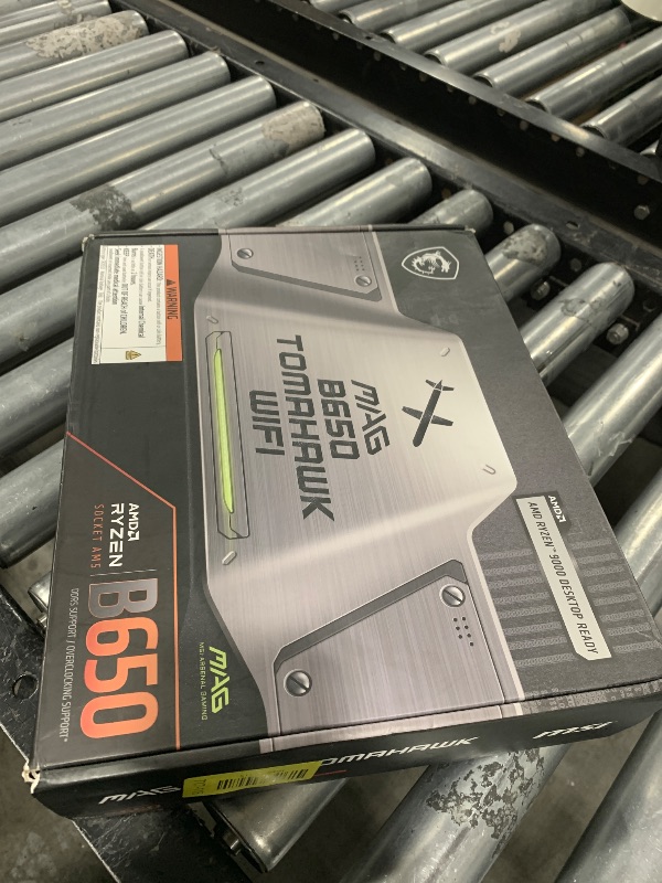 Photo 1 of MSI MAG B650 Tomahawk WiFi Gaming Motherboard (AMD Ryzen 9000/8000/7000 Series Processors, AM5, DDR5, PCIe 4.0, M.2, SATA 6Gb/s, USB 3.2 Gen 2, HDMI/DP, Wi-Fi 6E, Bluetooth 5.3, 2.5Gbps LAN, ATX)