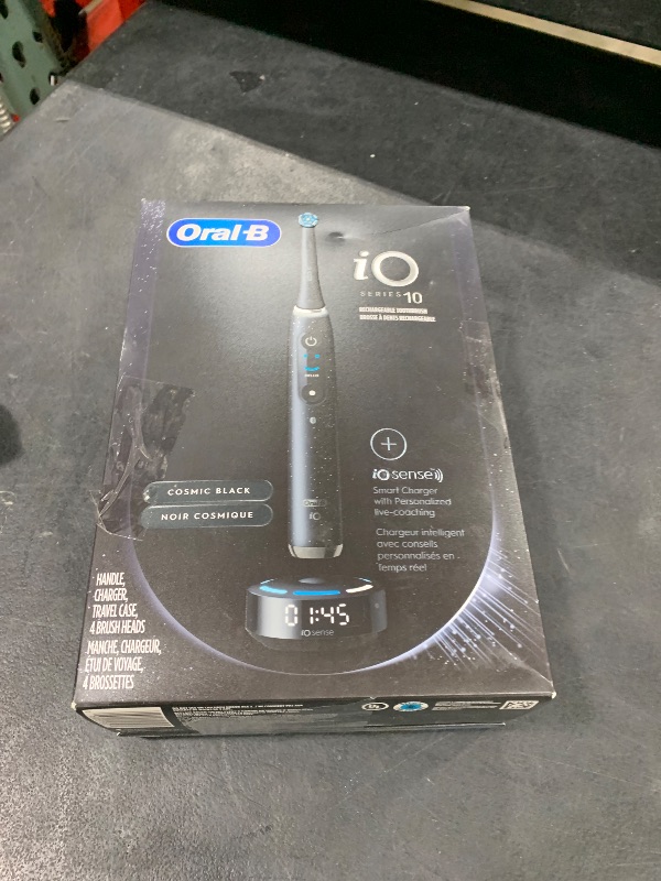 Photo 1 of Oral-B iO Series 10 Rechargeable Electric Toothbrush with Visible Pressure Sensor to Protect Gums, 2 Min Timer, 7 Cleaning Settings, 4 Replacement Toothbrush Heads, and Charging Travel Case, Black