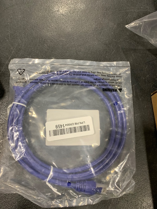 Photo 1 of Monoprice Cat6A 5ft Purple Patch Cable Double Shielded (S/FTP) 26AWG 10G Pure Bare Copper Snagless RJ45 Fullboot Series Ethernet Cable
