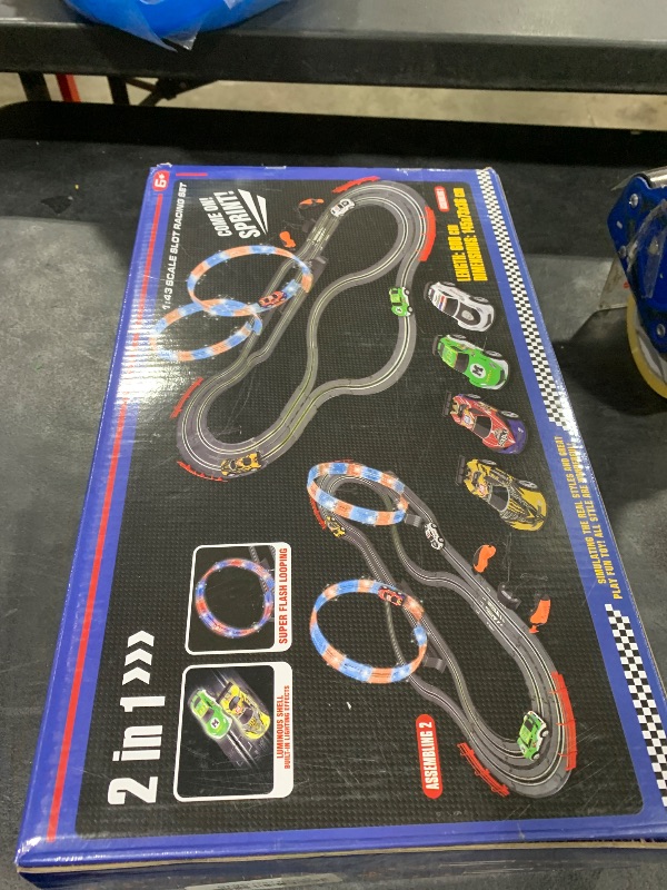Photo 1 of 2-in-1 Slot Car Race Track Set with 4 High-Speed Cars, Electric Track, Dual Racing Game with 2 Controllers, Circular Overpass Design Featuring Flash Tracks. Toy Gift for Boys Kids Ages 4-6 6-8 8-12