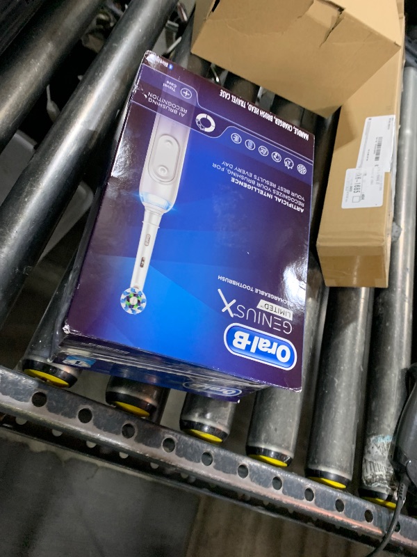 Photo 1 of Oral-B Genius X Limited Rechargeable Electric Toothbrush with 1 Replacement Brush Head, Travel Case, White