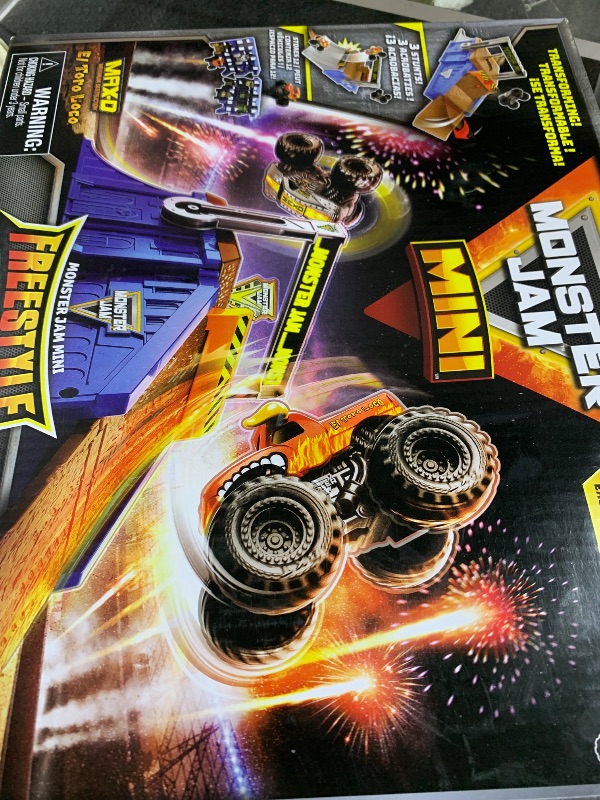 Photo 1 of Monster Jam Mini Freestyle Flip Arena Playset and Storage with 2 Mini Trucks, Kids Toys for Boys and Girls Ages 3 and up