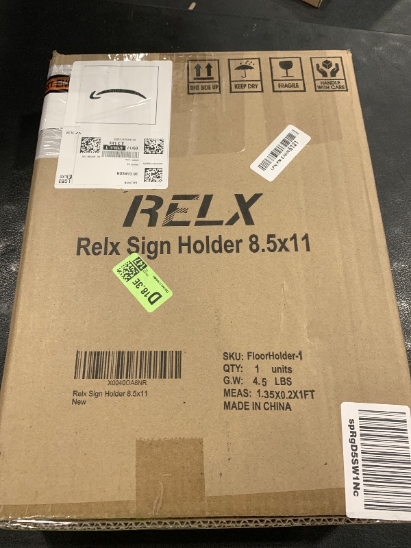 Photo 1 of Relx Sign Holder Stand 8.5x11 inch - Adjustable Floor Standing Sign Holder - Signage Stand with Snap-Open Frame Display for Malls,Schools,Restaurants