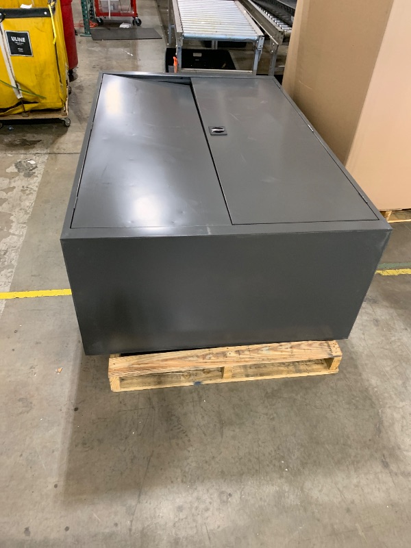 Photo 1 of Gray storage box with wheels for garage 