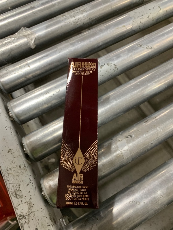 Photo 1 of Charlotte Tilbury Airbrush Flawless Setting Spray - Ultra-Fine Hydrating Mist to Prime & Set Face Makeup For Up to 16Hr - Soothes, Blurs Pores & Calms Skin (200ml)