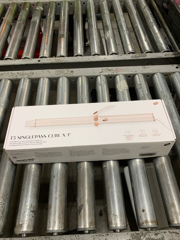 Photo 1 of T3 SinglePass Curl X Extra-Long Barrel Curling Iron with 9 Heat Settings and Ceramic Barrel for Fast Styling and Lasting Results on All Hair Types