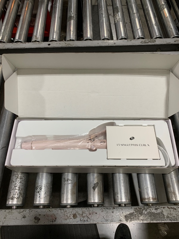Photo 1 of T3 SinglePass Curl X Extra-Long Barrel Curling Iron with 9 Heat Settings and Ceramic Barrel for Fast Styling and Lasting Results on All Hair Types