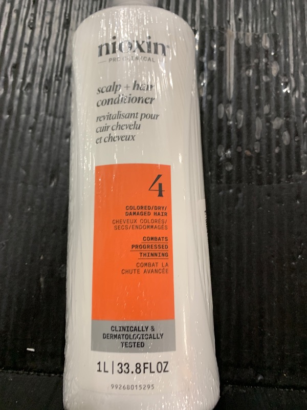 Photo 1 of Nioxin System 4 Scalp + Hair Conditioner | For Colored or Damaged Hair with Progressed Thinning | With Niacinamide and Biotin | 33.8 Fl oz.