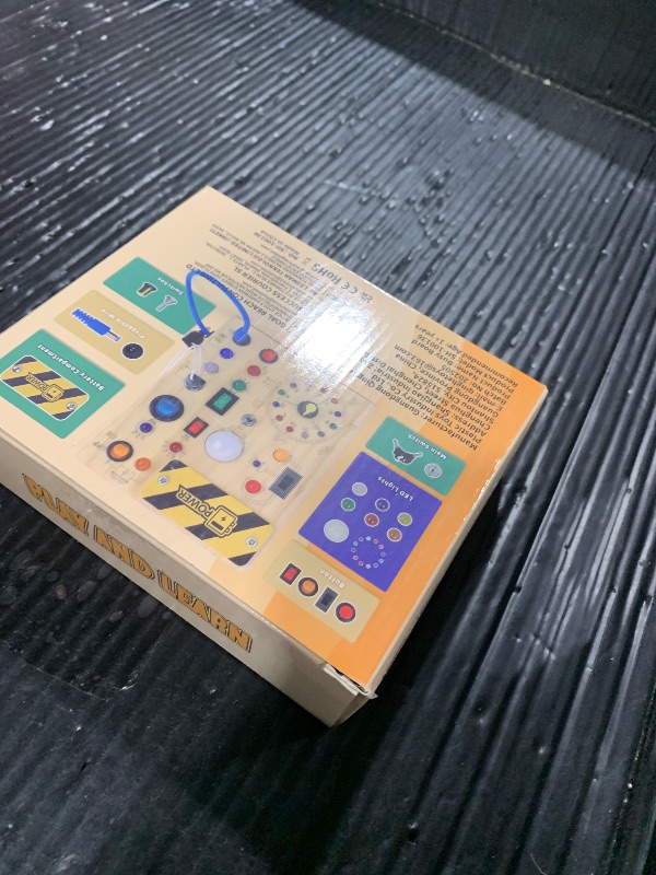 Photo 1 of Iabedi Busy Board, Montessori Toy for 1-3 Years Old, Wooden Toddler Sensory Travel Toy, Ideal Gift for 1+ Year Old Boys (Busy Board Plus V2), Medium, Yellow