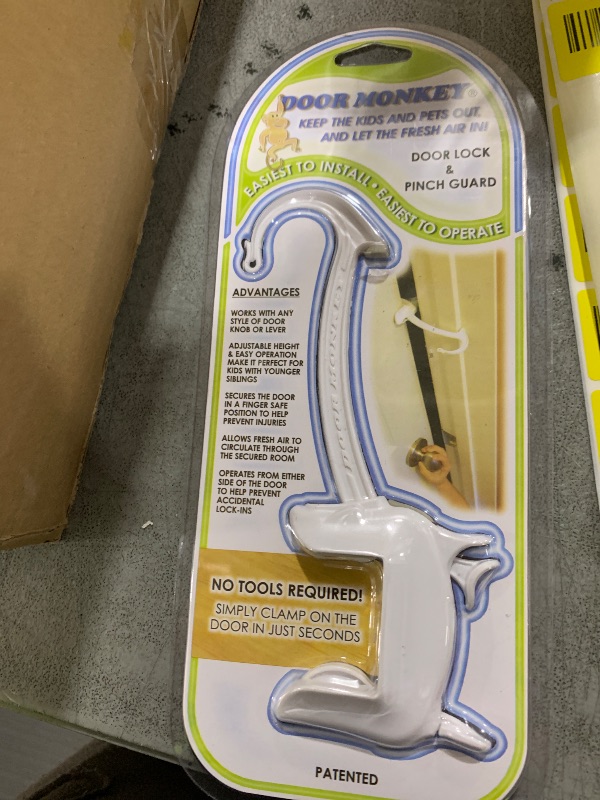 Photo 1 of DOOR MONKEY Child Proof Door Lock & Pinch Guard - For Door Knobs & Lever Handles - Easy to Install - No Tools or Tape Required - Baby Safety Door Lock For Kids - Very Portable - Great for Dogs & Cats