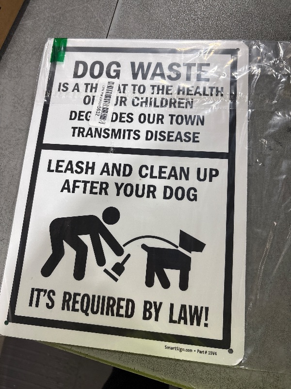 Photo 1 of SmartSign 14 x 10 inch “Dog Waste Is A Threat - Leash And Clean Up After Your Dog” Metal Sign, 40 mil Laminated Rustproof Aluminum, Black and White, Made in USA