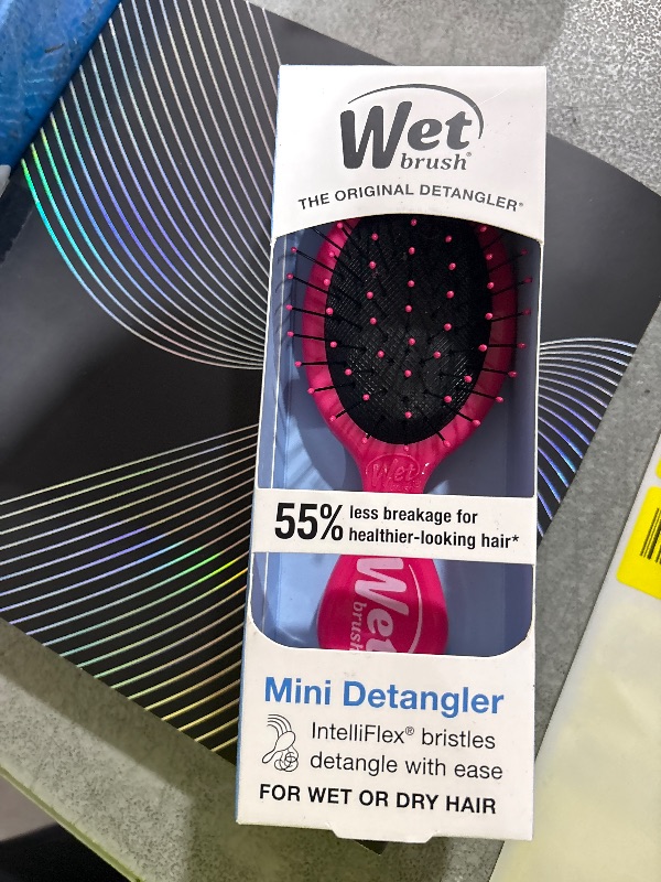 Photo 1 of Wet Brush Mini Detangler Hair Brush, Pink, Detangling Travel Hairbrush, Ultra-Soft IntelliFlex Bristles Glide Through Tangles with Ease, Pain-Free, All Hair Types