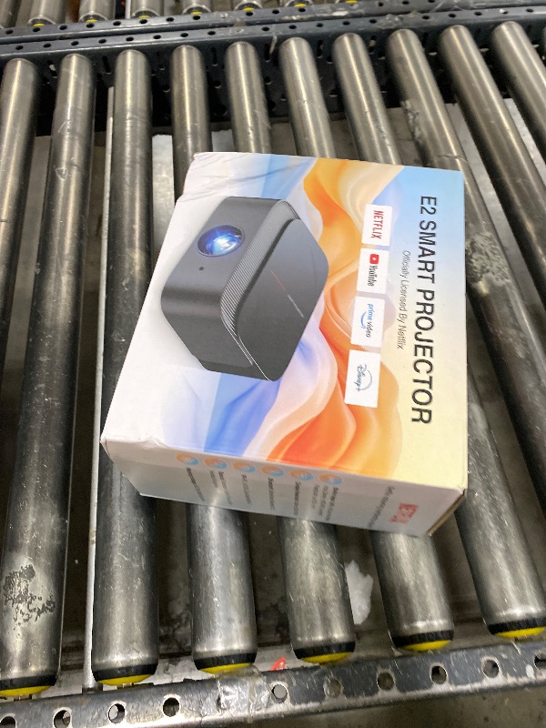 Photo 1 of [2025 Netflix-Licensed | 386+ Built-in Apps] DBPOWER E2 Smart Projector with WiFi and Bluetooth, Mini Projector 4K Support with Netflix, Youtube, Disney+, Hulu, Max, Crunchyroll w Portable Case