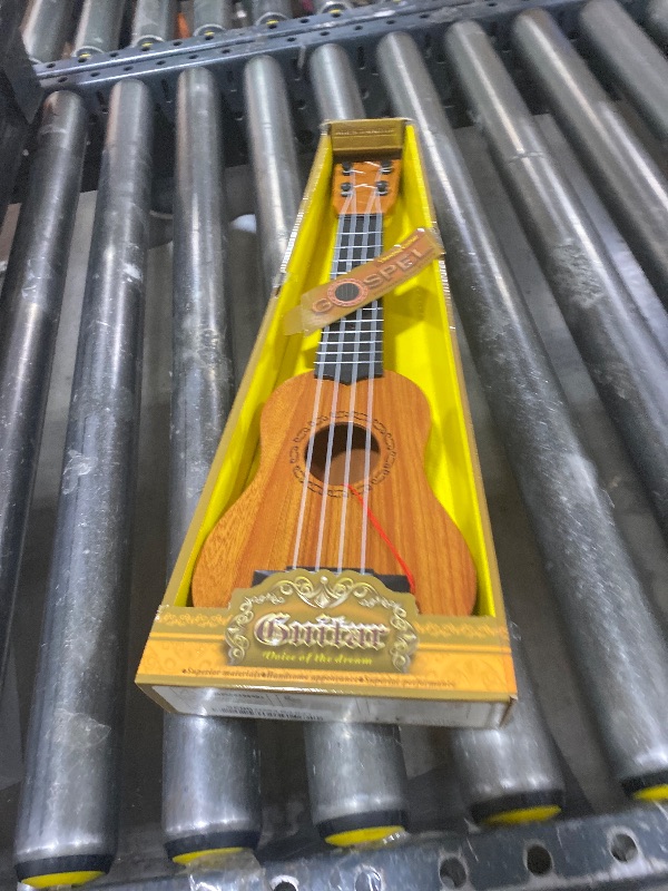 Photo 1 of Kids Toy Ukulele Guitar,17 Inch Classical Guitar Musical Toy,4 Strings Guitar Ukulele Educational Learning Toy for Toddlers and Preschoolers