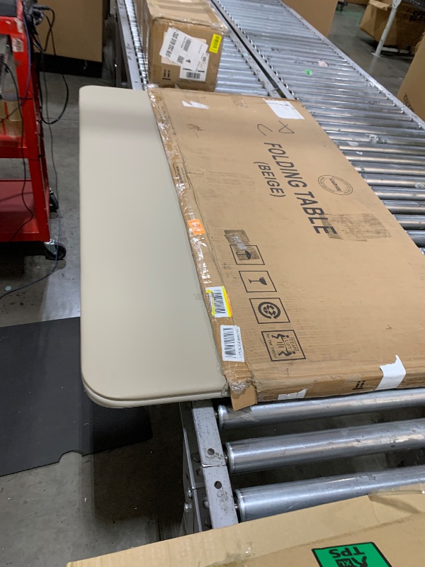 Photo 1 of Folding table beige color 