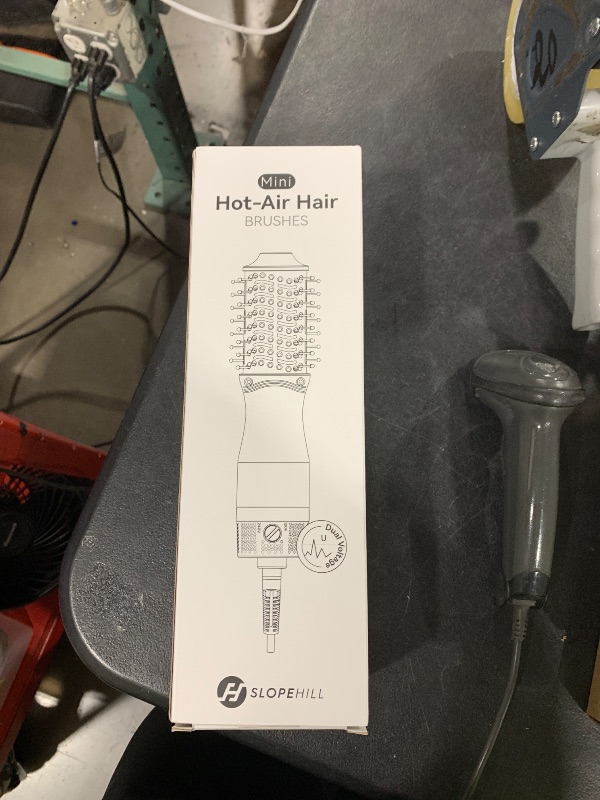 Photo 1 of slopehill Mini Dual Voltage Hair Dryer Brush,1000 Watts Travel Hot Air Brush with European Plug, Ionic One Step Hair Dryer and Styler for Women for Home & Salon, Oval Barrel 2 Heat & 2 Speed Settings